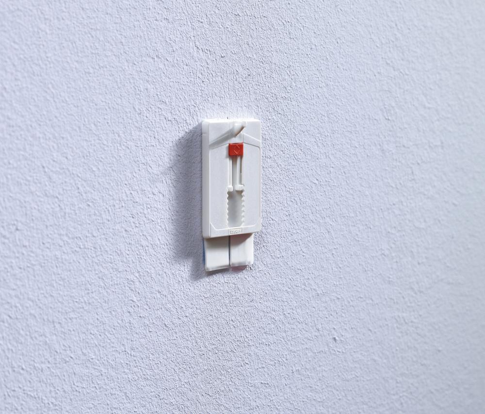 Tesa - Justerbar självhäftande spik för alla typer av väggar (max 2x2kg)