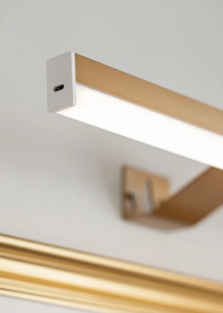 KAILA Glow Batteridriven Tavelbelysning 55 cm - Guld